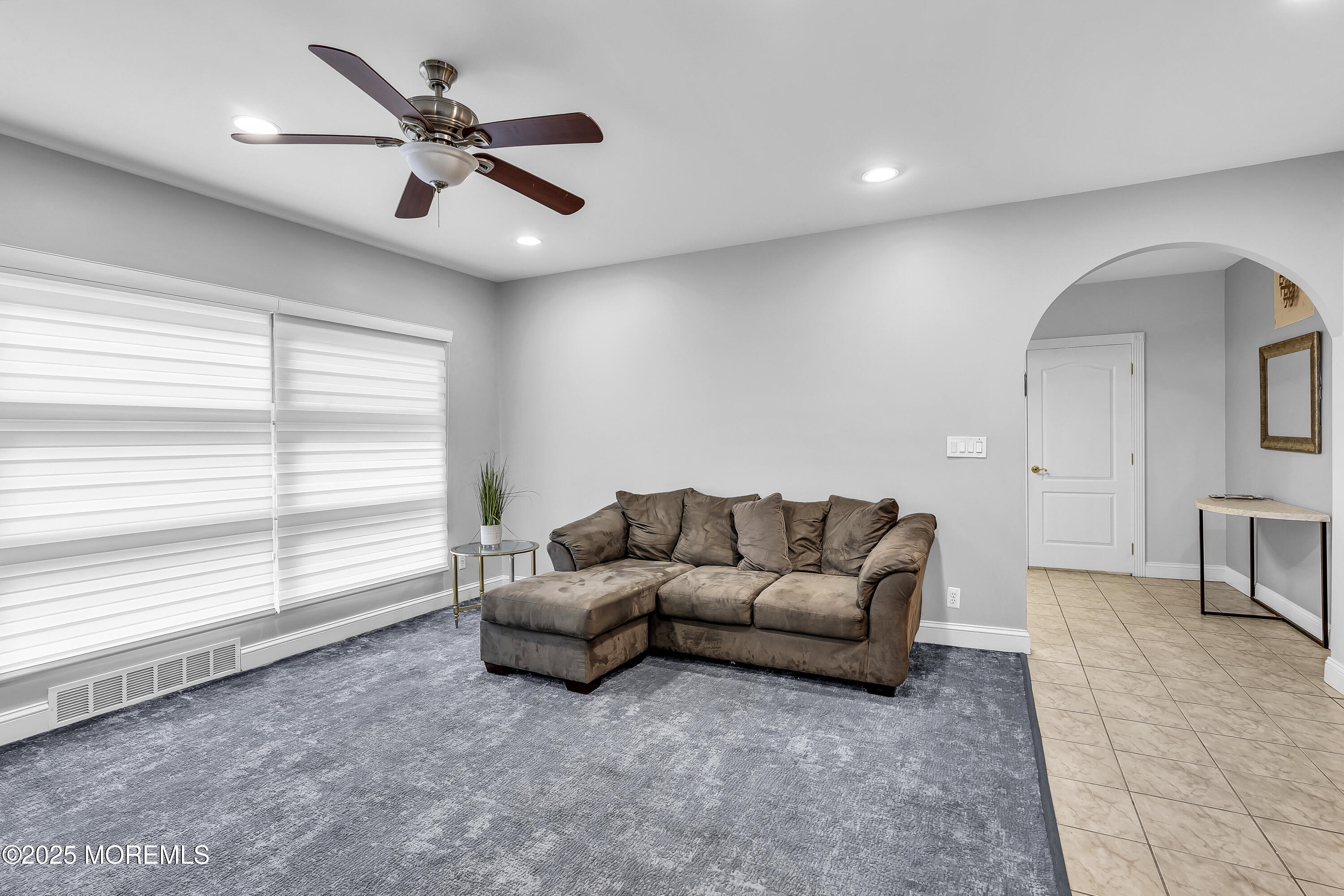 100 Case Road Lakewood, NJ 08701 - Photo 16 of 36 a living room with furniture and a large window