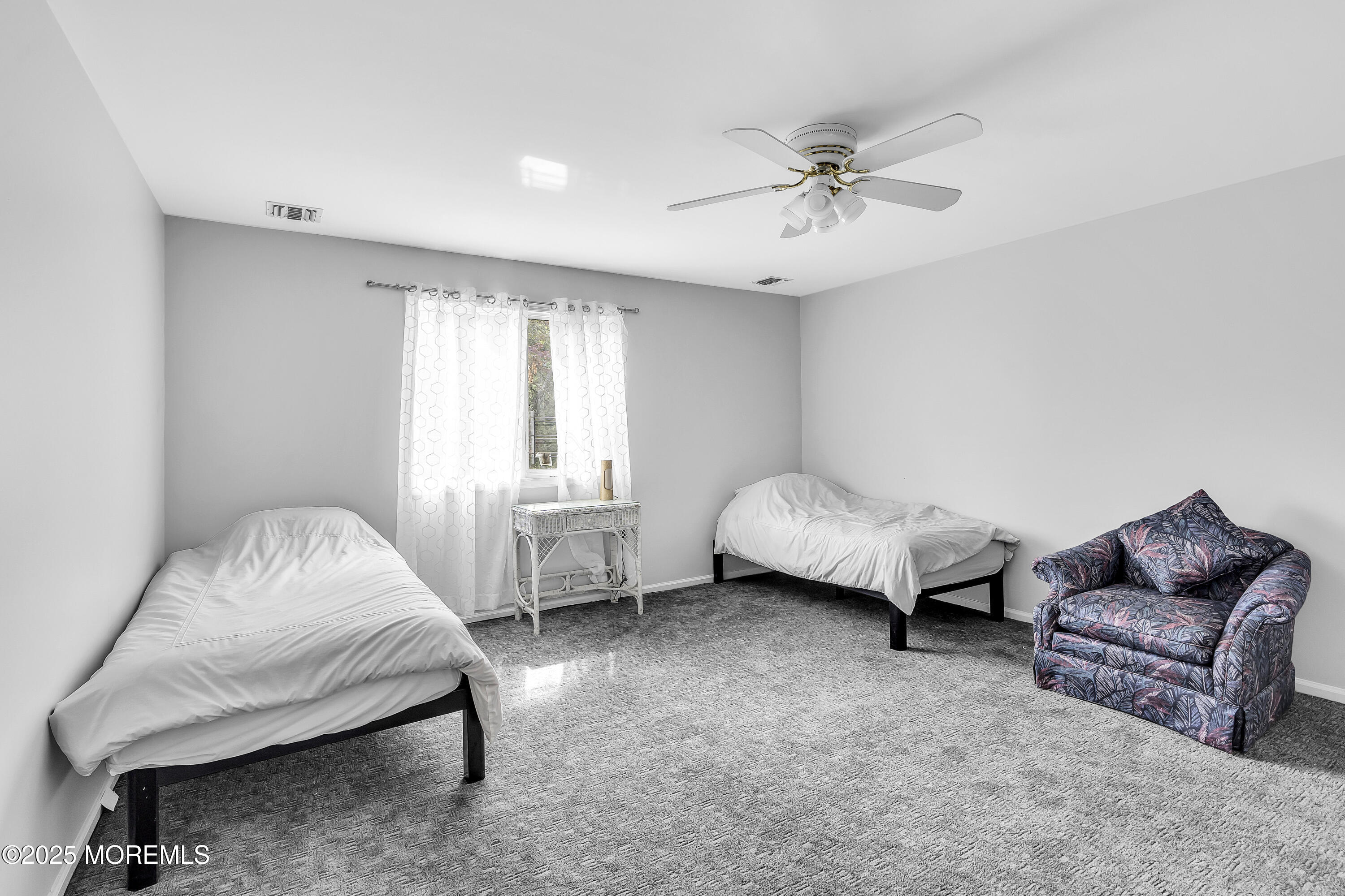 100 Case Road Lakewood, NJ 08701 - Photo 24 of 36 a bedroom with a bed and window