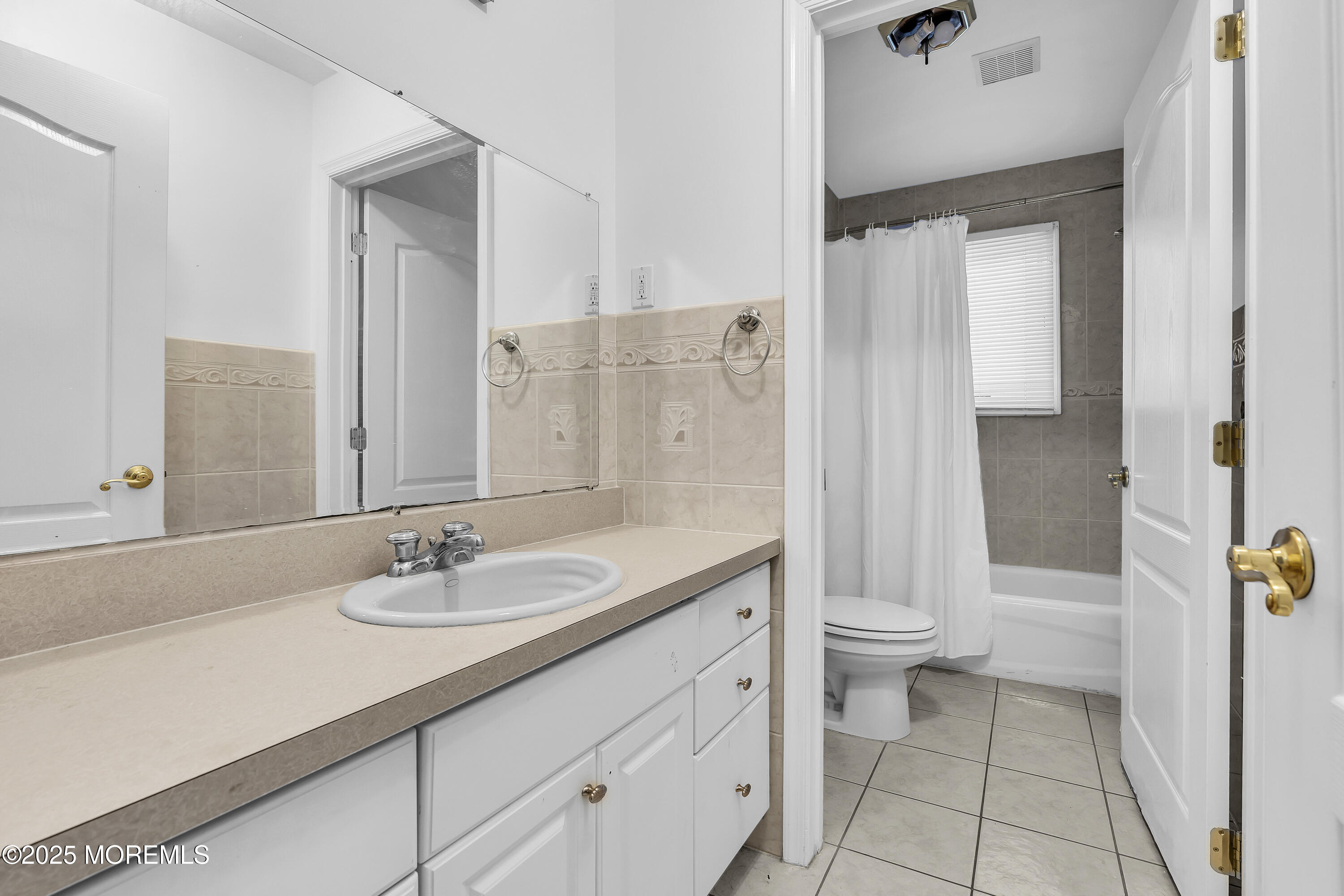 100 Case Road Lakewood, NJ 08701 - Photo 26 of 36 a bathroom with a sink a toilet and shower