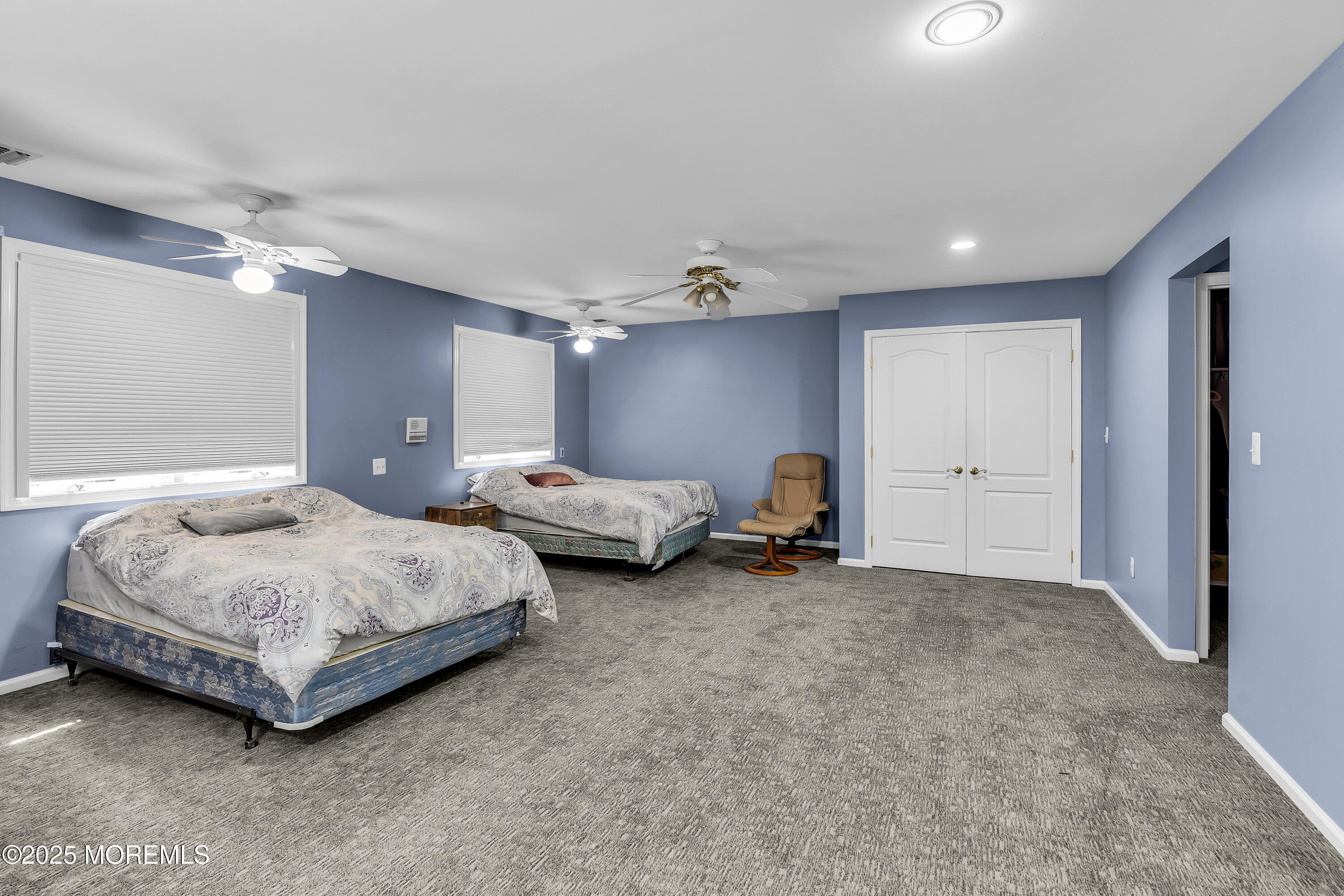 100 Case Road Lakewood, NJ 08701 - Photo 28 of 36 a bedroom with bed and a chandelier