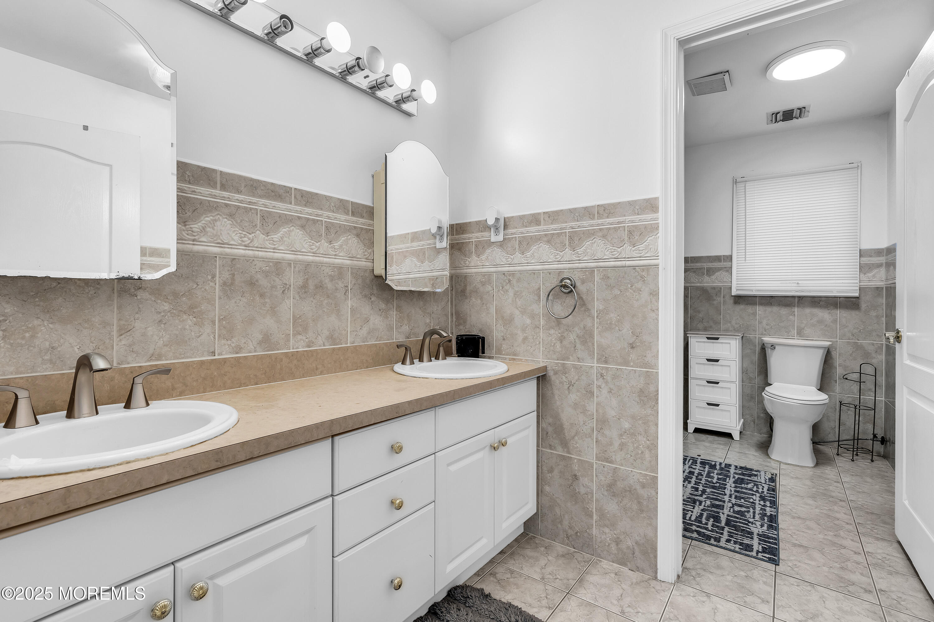 100 Case Road Lakewood, NJ 08701 - Photo 30 of 36 a spacious bathroom with a sink a toilet and a shower
