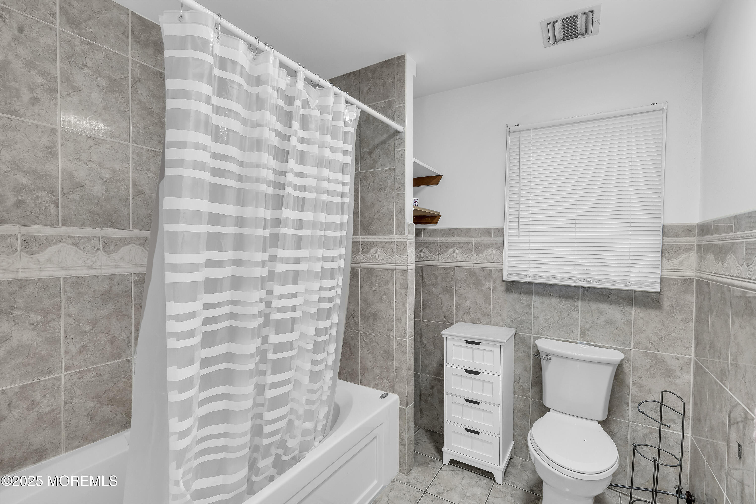 100 Case Road Lakewood, NJ 08701 - Photo 31 of 36 a bathroom with a toilet and a shower