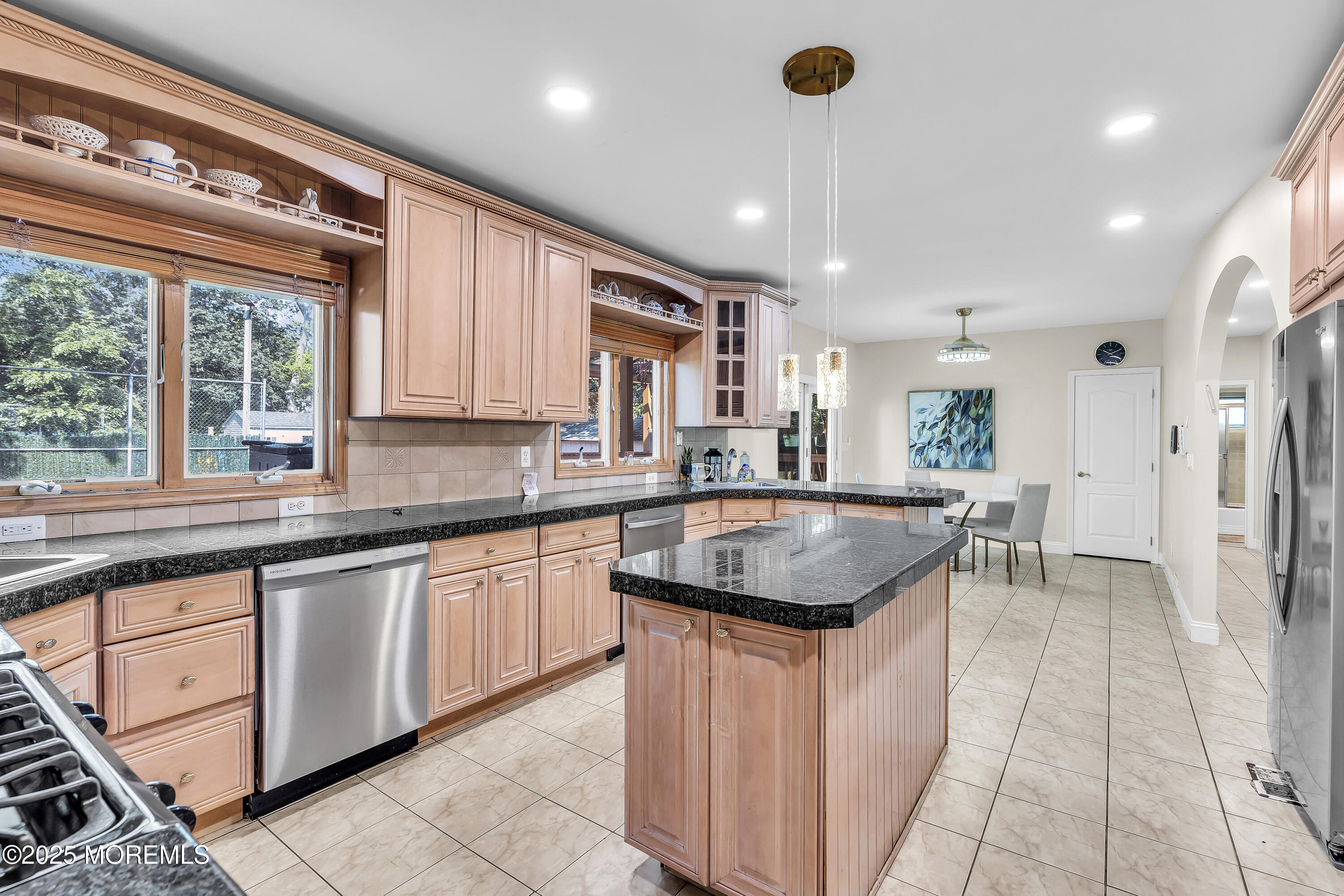 100 Case Road Lakewood, NJ 08701 - Photo 9 of 36 a kitchen with stainless steel appliances granite countertop a sink and a stove