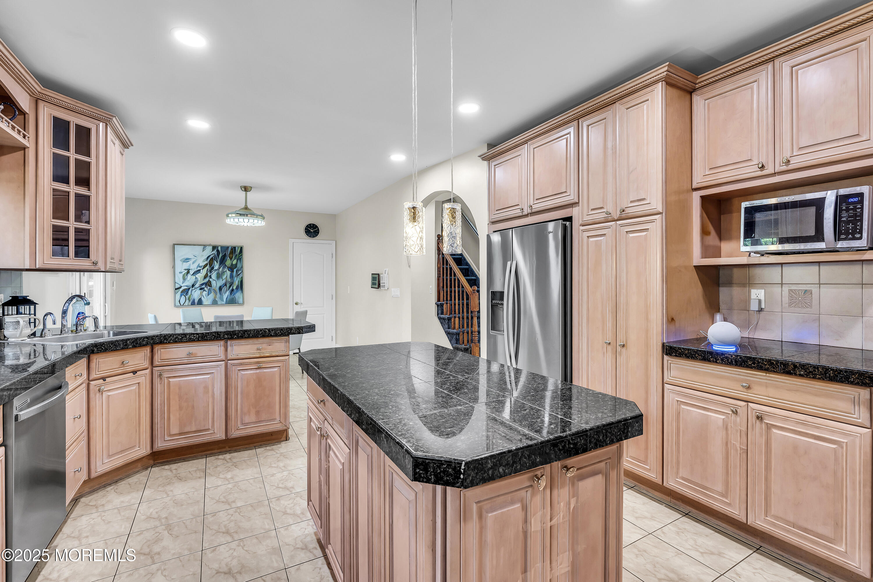 100 Case Road Lakewood, NJ 08701 - Photo 10 of 36 a kitchen with stainless steel appliances granite countertop a sink refrigerator and cabinets