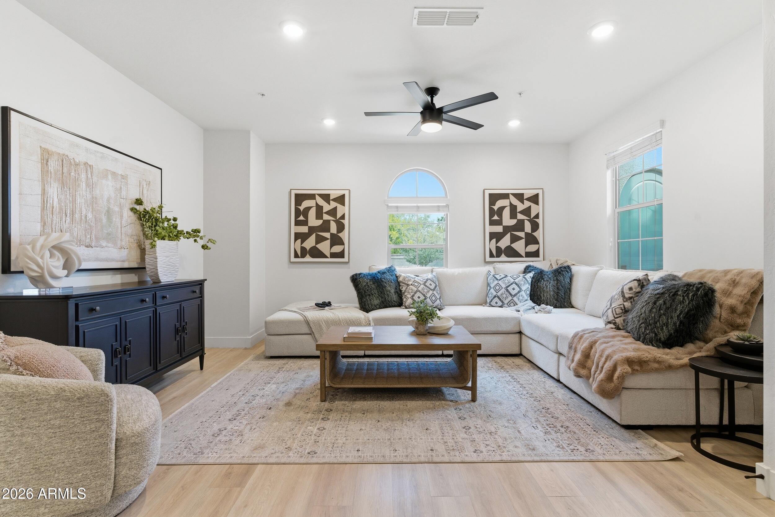 3855 South McQueen Road, Unit 34 Chandler, AZ 85286 - Photo 12 of 48 a living room with furniture