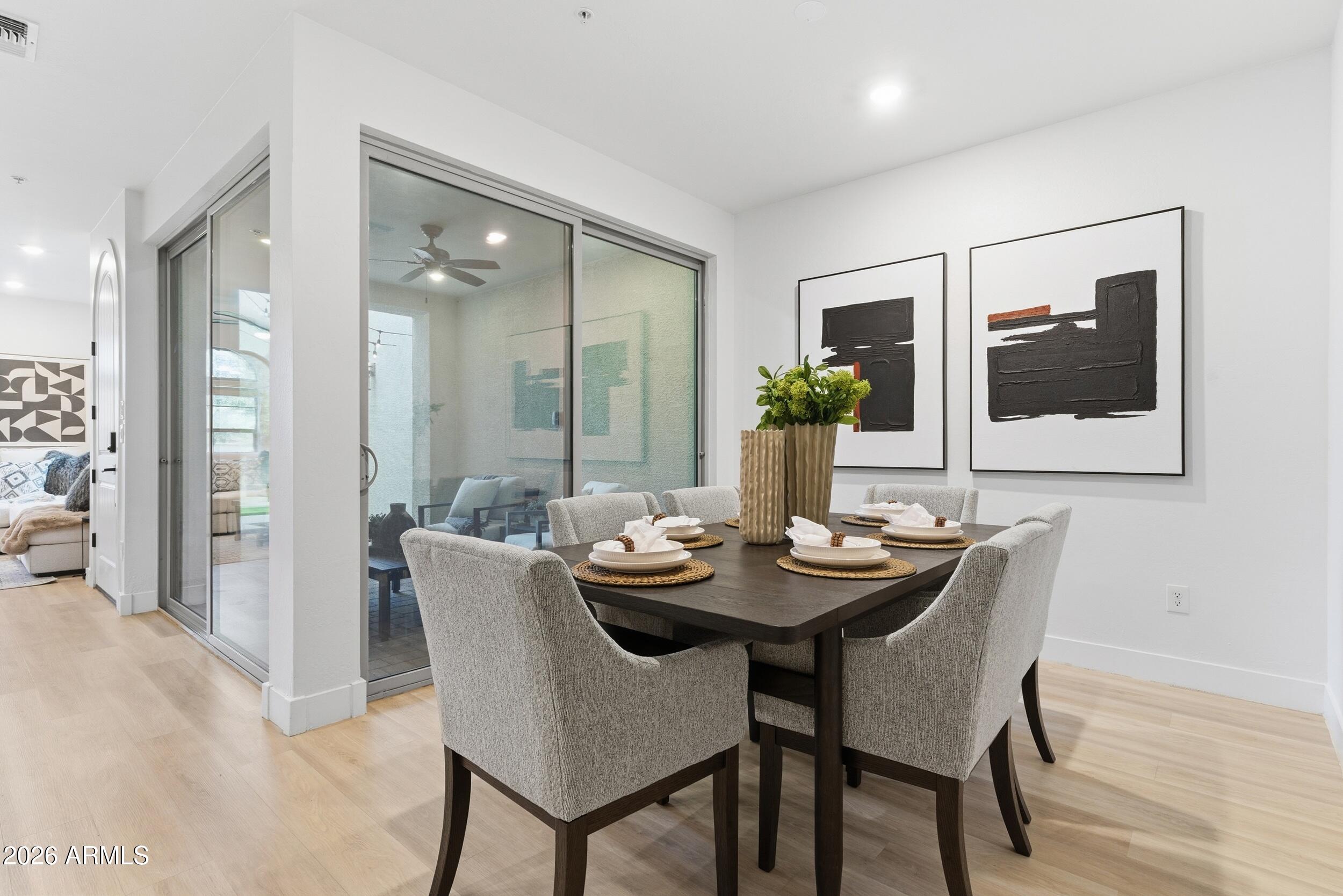 3855 South McQueen Road, Unit 34 Chandler, AZ 85286 - Photo 16 of 48 a dining room with furniture and window