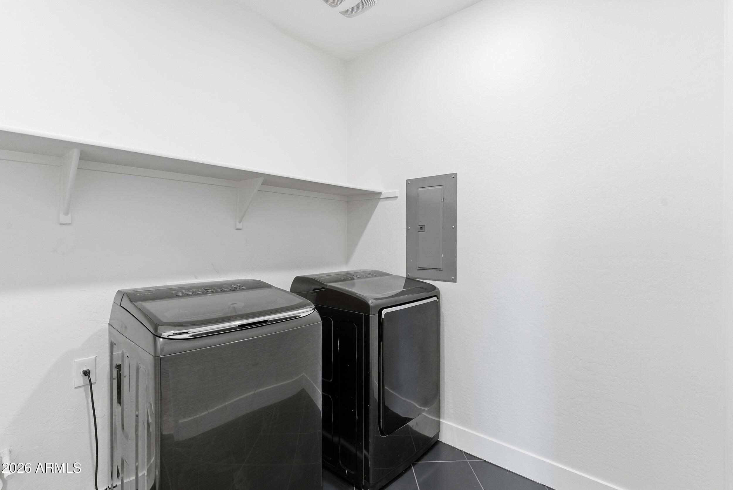 3855 South McQueen Road, Unit 34 Chandler, AZ 85286 - Photo 26 of 48 a utility room with dryer and washer