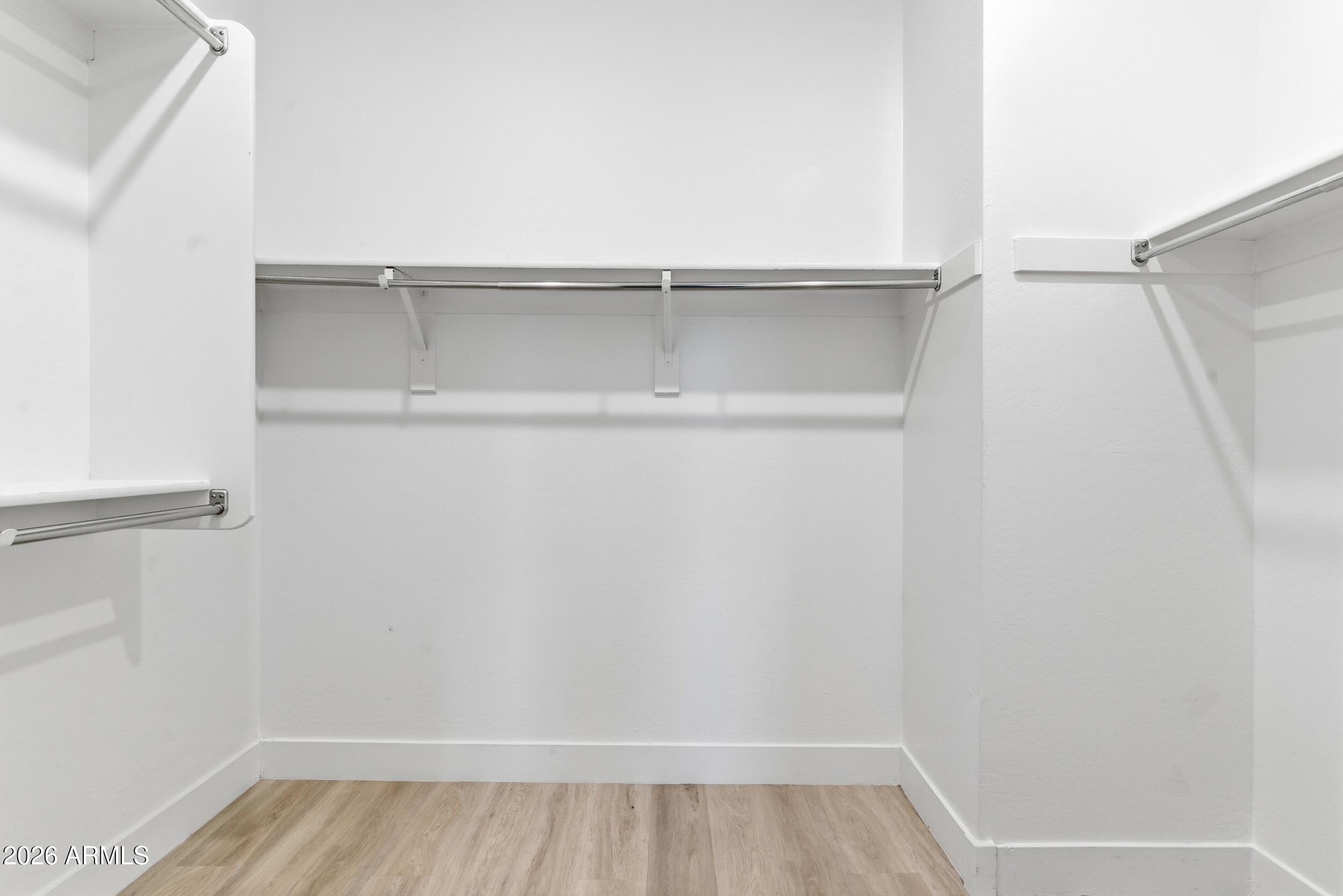3855 South McQueen Road, Unit 34 Chandler, AZ 85286 - Photo 31 of 48 a view of walk in closet with empty racks