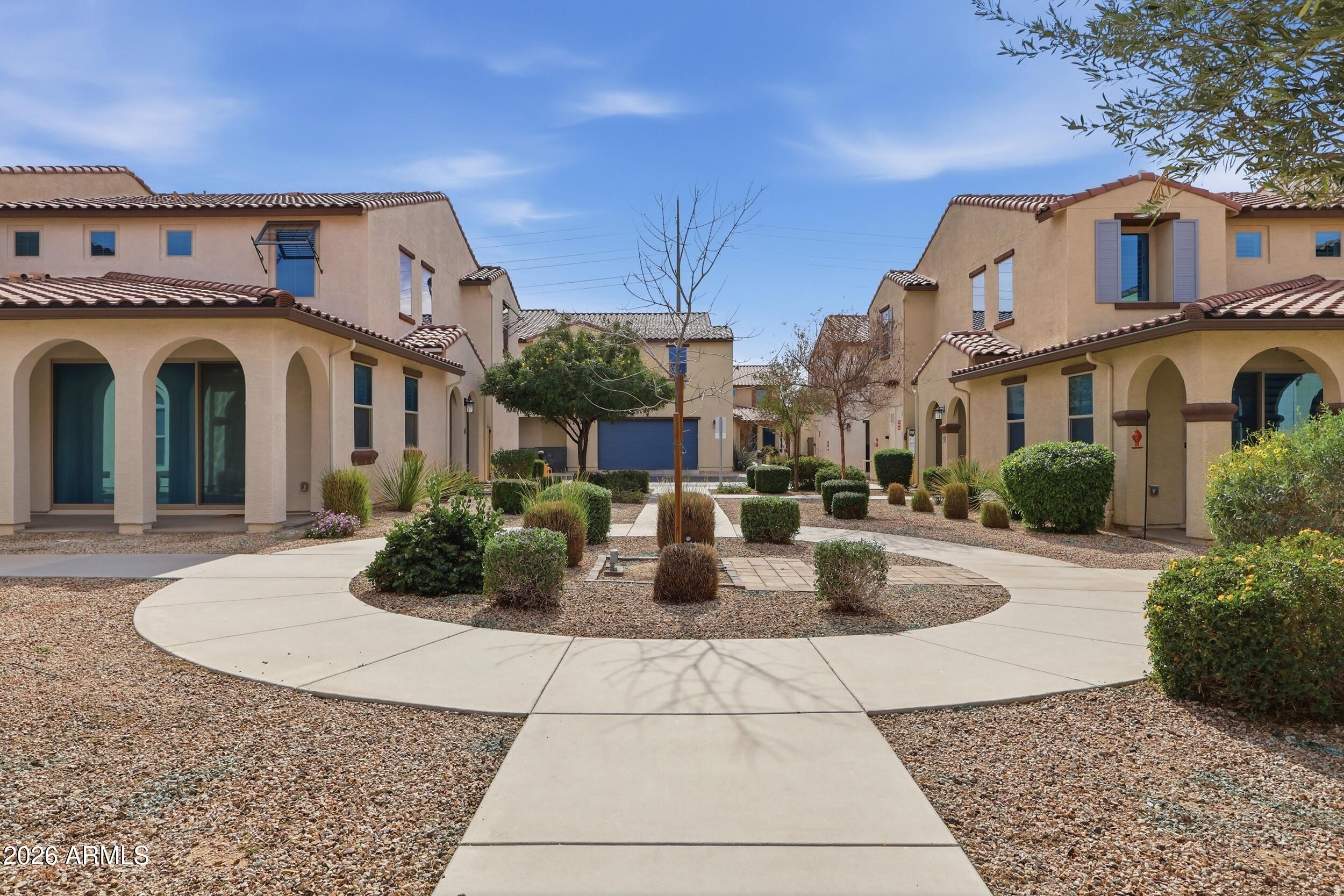 3855 South McQueen Road, Unit 34 Chandler, AZ 85286 - Photo 42 of 48 a view of a building with potted plants