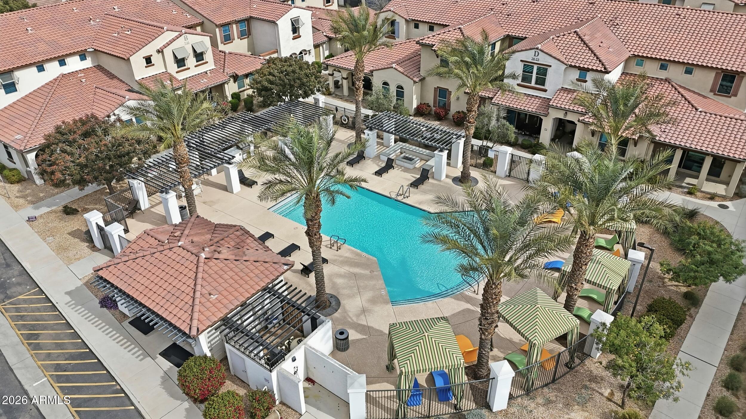 3855 South McQueen Road, Unit 34 Chandler, AZ 85286 - Photo 44 of 48 an aerial view of multiple houses with yard