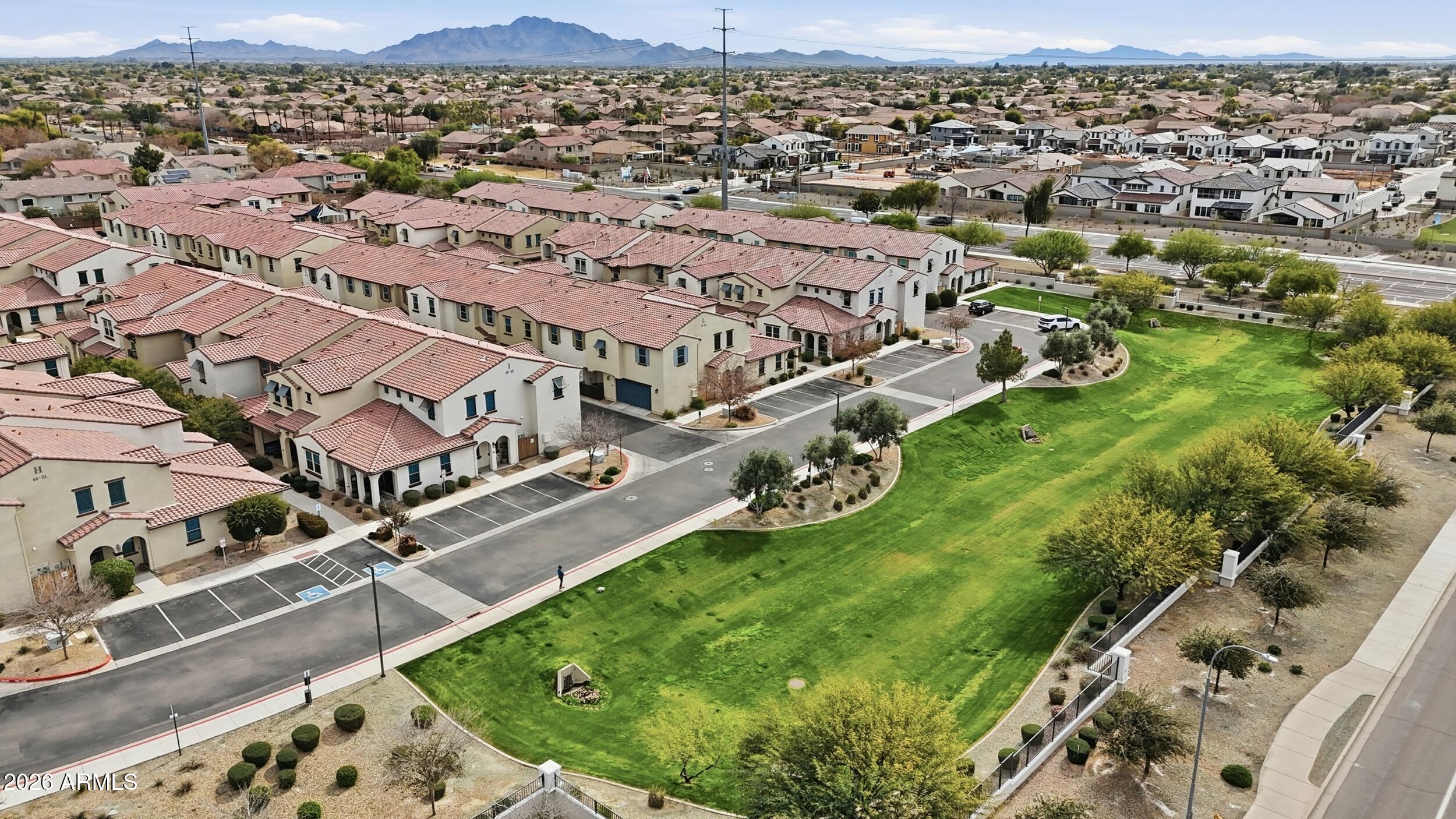3855 South McQueen Road, Unit 34 Chandler, AZ 85286 - Photo 45 of 48 an aerial view of residential houses with outdoor space and trees