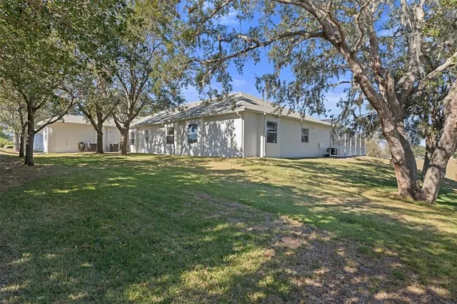 a view of a house with a park