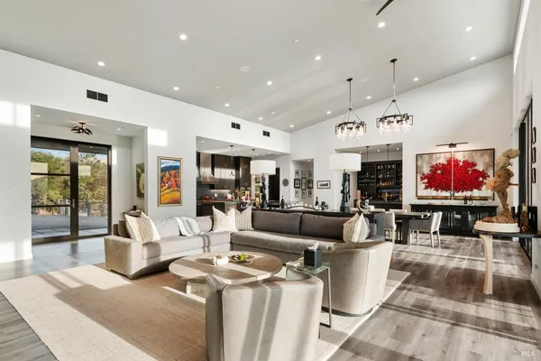 a living room with fireplace furniture and a flat screen tv