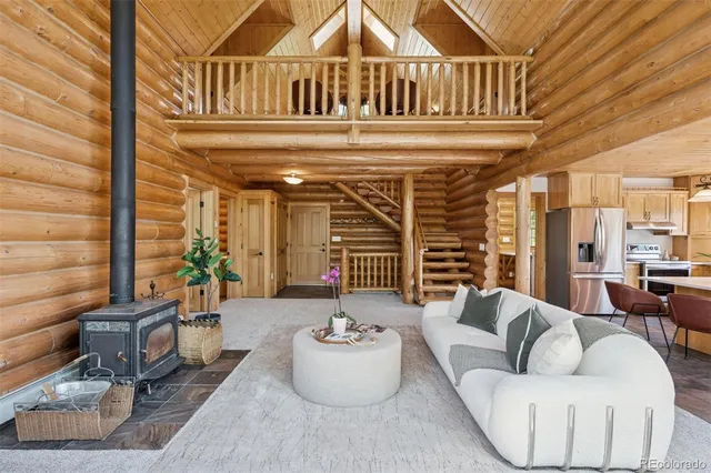 a bedroom with a large bed and a large window