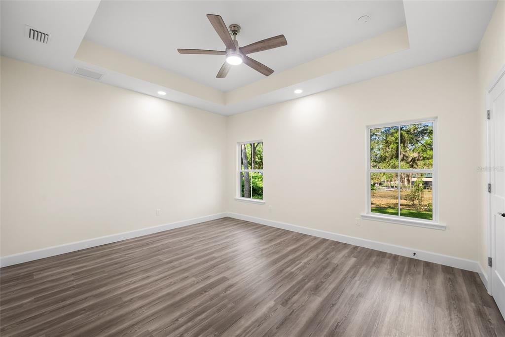 332 Southeast 3rd Avenue Melrose, FL 32666 - Photo 19 of 36 wooden floor in an empty room with a window