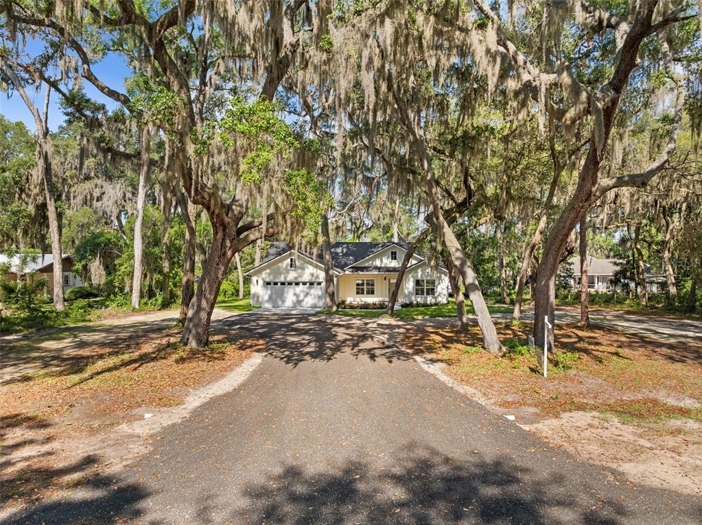 332 Southeast 3rd Avenue Melrose, FL 32666 - Photo 5 of 36 a view of a road with a building in the background