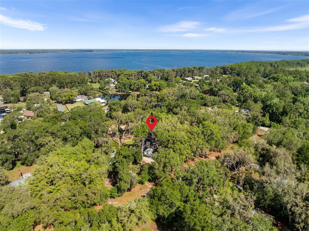 332 Southeast 3rd Avenue Melrose, FL 32666 - Photo 8 of 36 a view of an outdoor space with a lake view