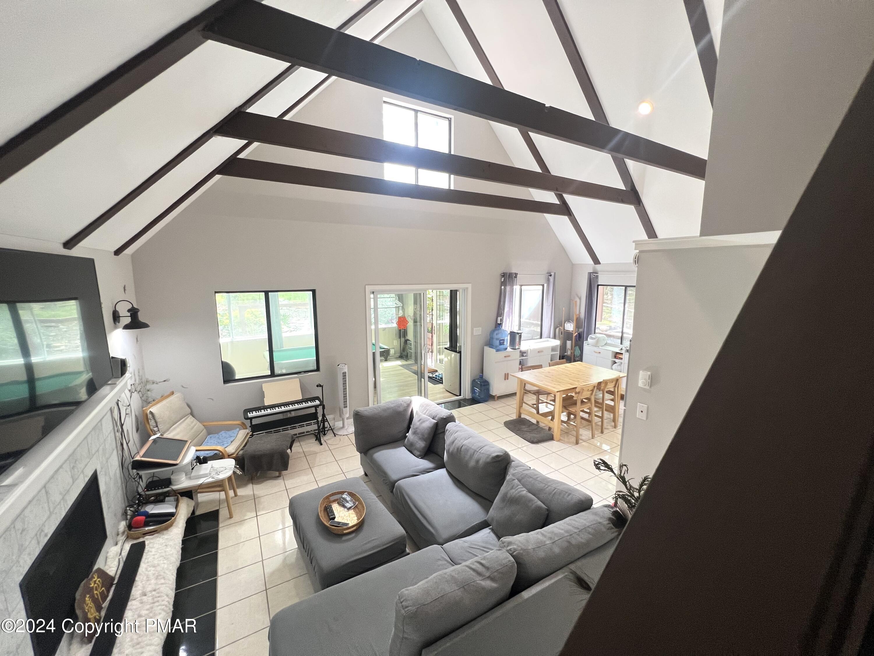 236 Regent Street Bushkill, PA 18324 - Photo 15 of 67 a living room with furniture and a flat screen tv