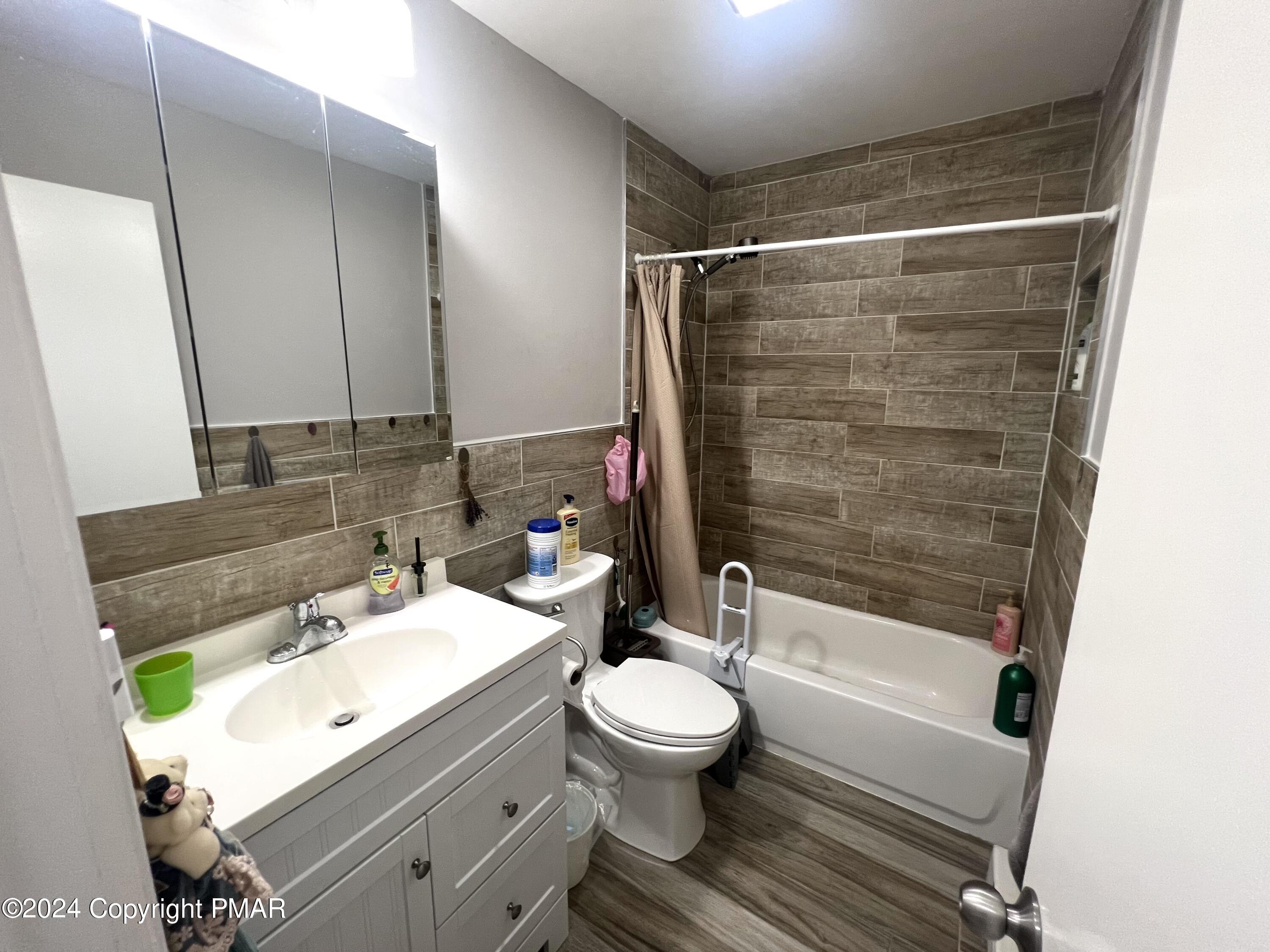236 Regent Street Bushkill, PA 18324 - Photo 18 of 67 a bathroom with a sink toilet and shower