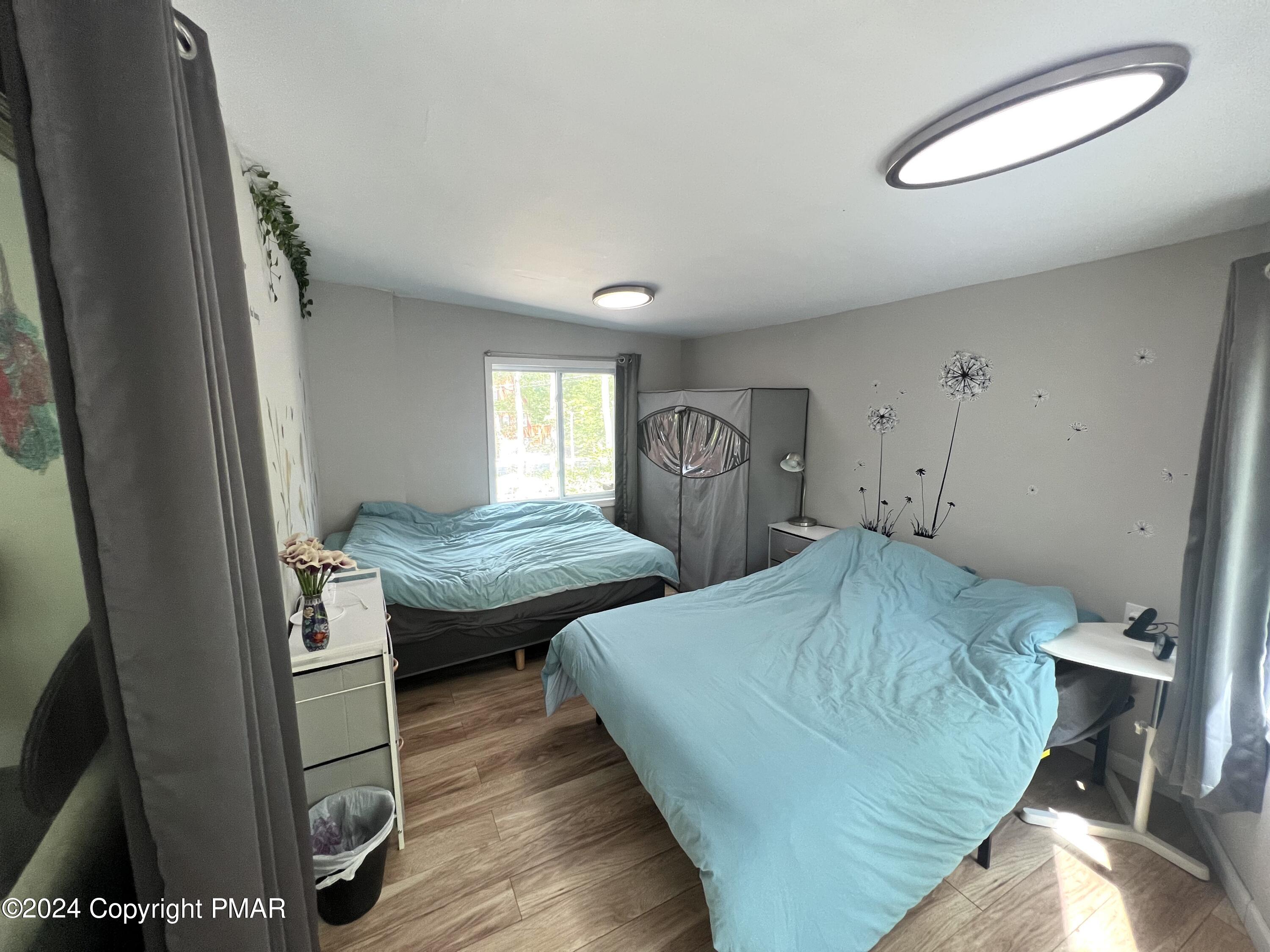 236 Regent Street Bushkill, PA 18324 - Photo 26 of 67 a bedroom with two beds and a dresser