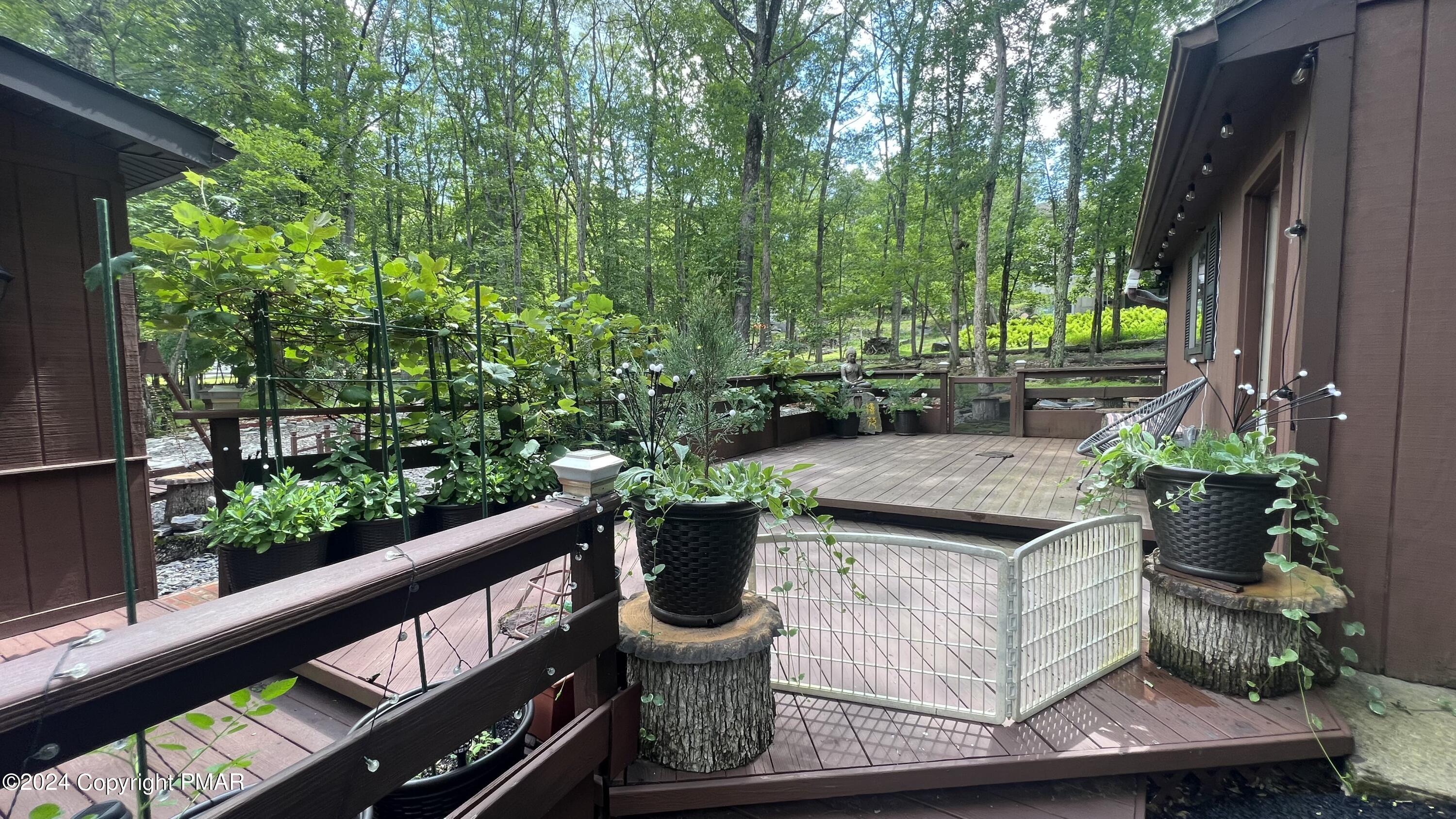 236 Regent Street Bushkill, PA 18324 - Photo 39 of 67 a wooden bench sitting in front of a building