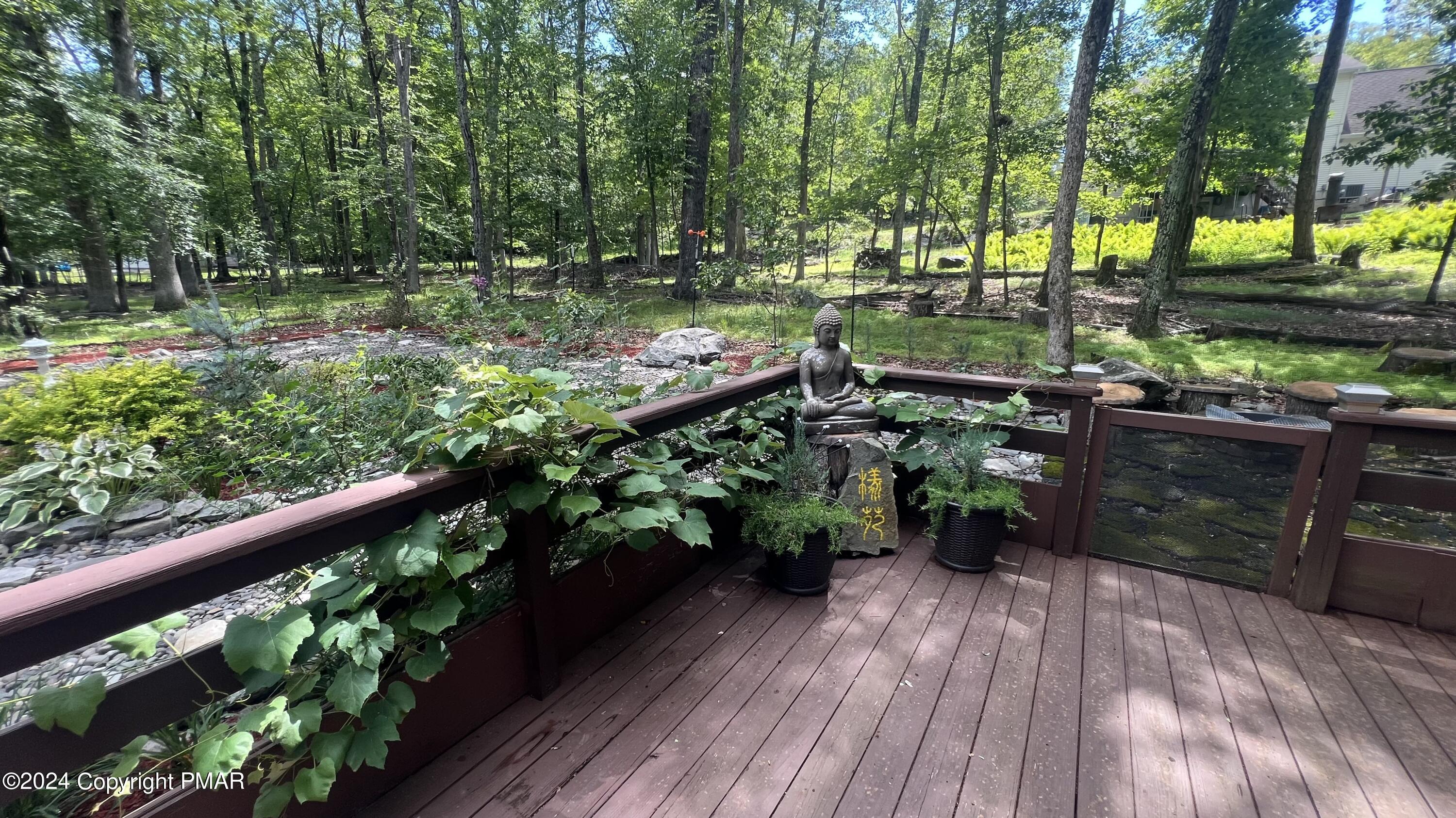 236 Regent Street Bushkill, PA 18324 - Photo 40 of 67 a view of a garden with wooden floor