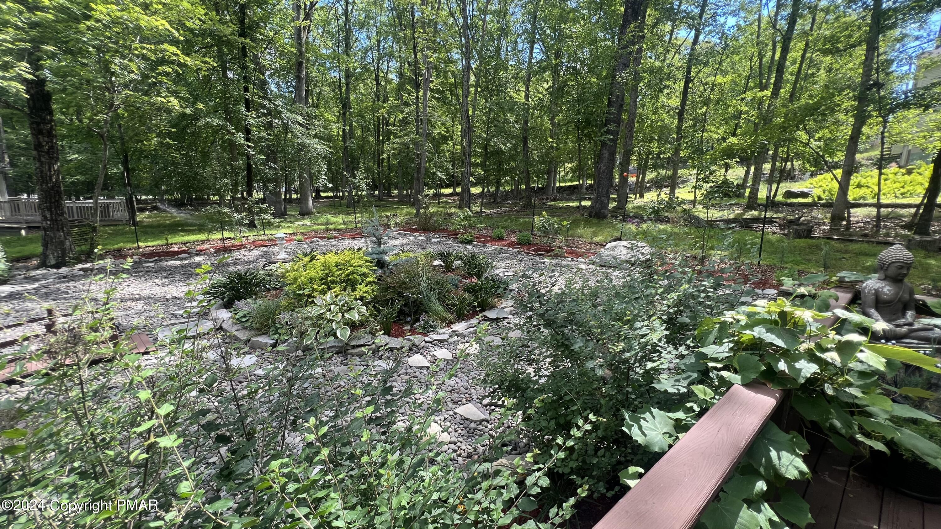 236 Regent Street Bushkill, PA 18324 - Photo 10 of 67 a view of outdoor space with deck and green space