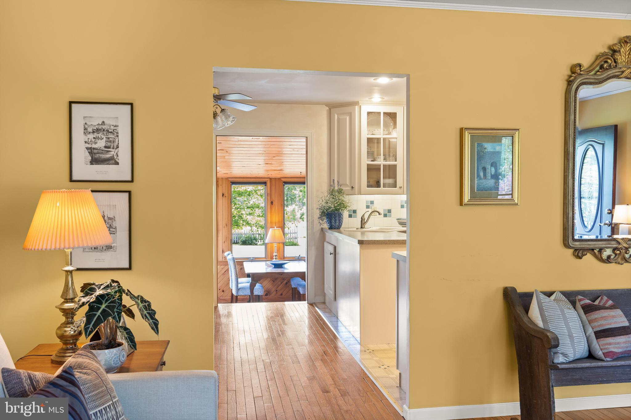 52 Prizer Road Phoenixville, PA 19460 - Photo 10 of 36 Living Room Into Eat In Kitchen and Sunroom Beyond