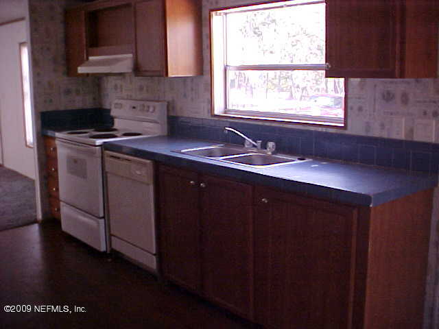 1896 Bellamy Road Florahome, FL 32140 - Photo 4 of 8 Kitchen with Range and DW