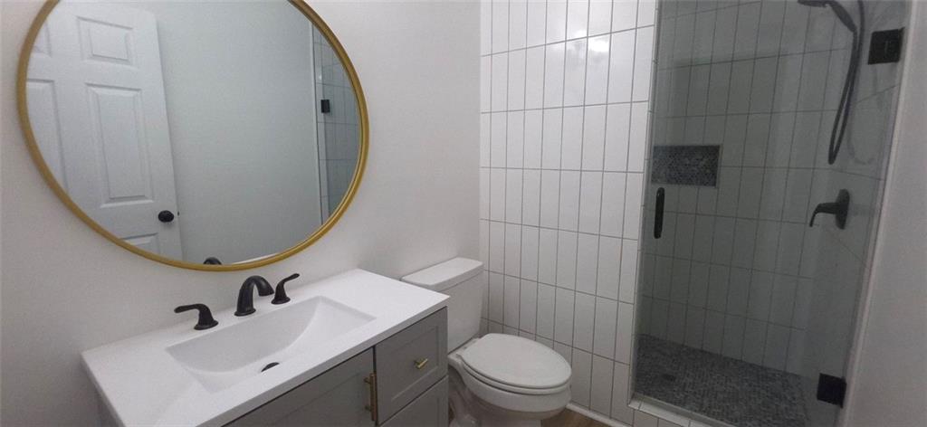 1774 Joe Black Road Sautee Nacoochee, GA 30571 - Photo 11 of 20 a bathroom with a sink toilet and shower