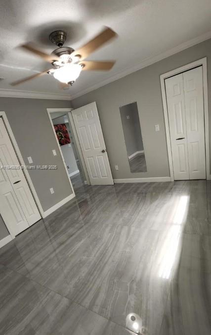 Genesis Lake Worth, FL 33460 - Photo 5 of 7 an empty room with wooden floor and windows