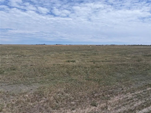 a view of ocean and mountains