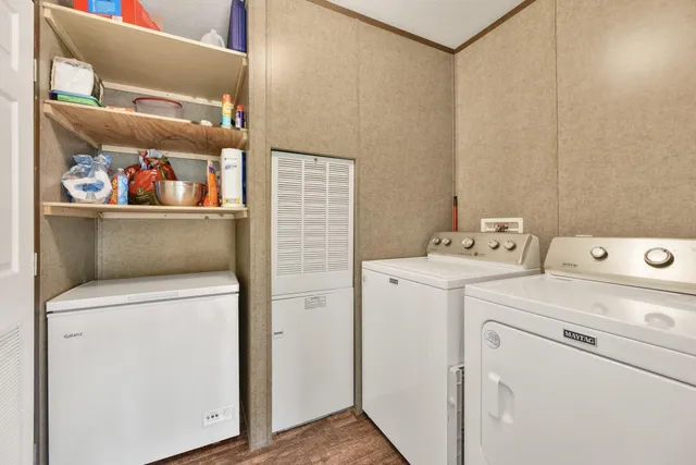 a utility room with dryer and washer