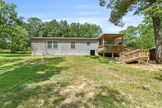 a house view with a garden space