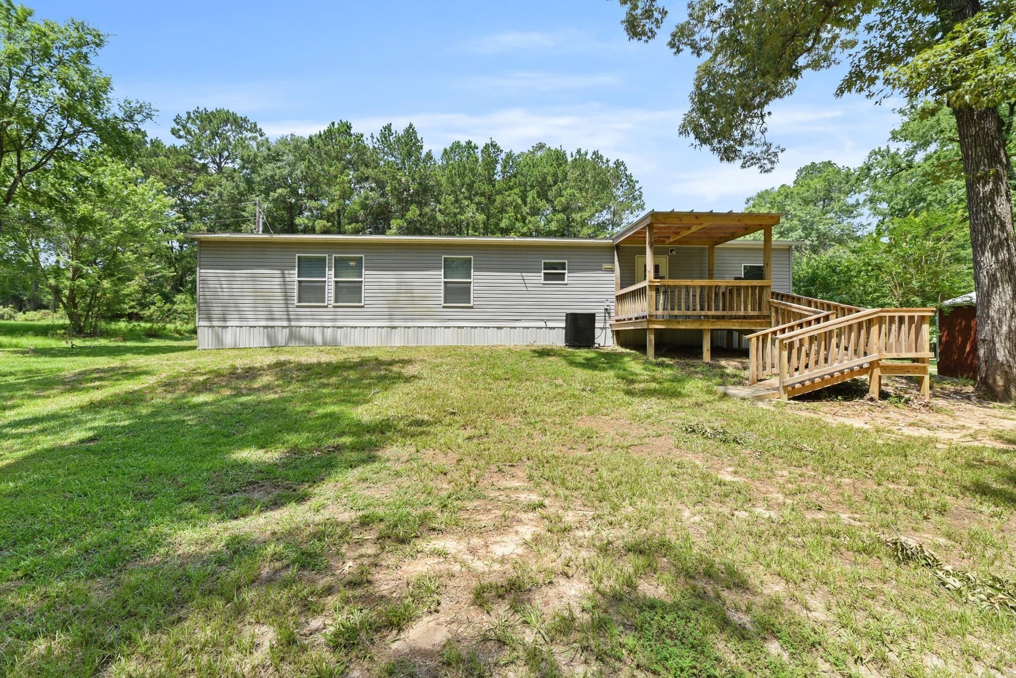 277 Rio Grande Drive Trinity, TX 75862 - Photo 20 of 28 a house view with a garden space