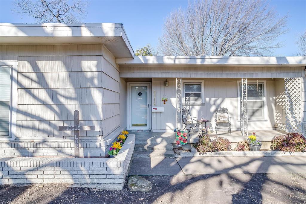 a view of a chairs and table in a patio