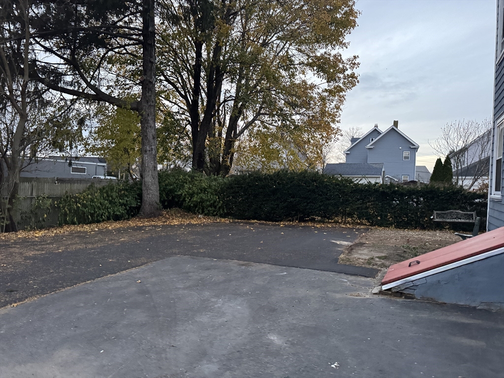40 Purchase Street, Unit 1 Taunton, MA 02780 - Photo 14 of 14 a view of a street with a large trees