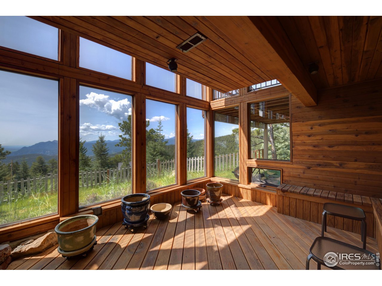 493 Sky Trail Road Boulder, CO 80302 - Photo 23 of 40 a view of a living room and furniture