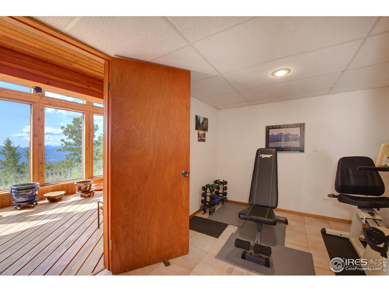 493 Sky Trail Road Boulder, CO 80302 - Photo 26 of 40 a view of a workspace with furniture