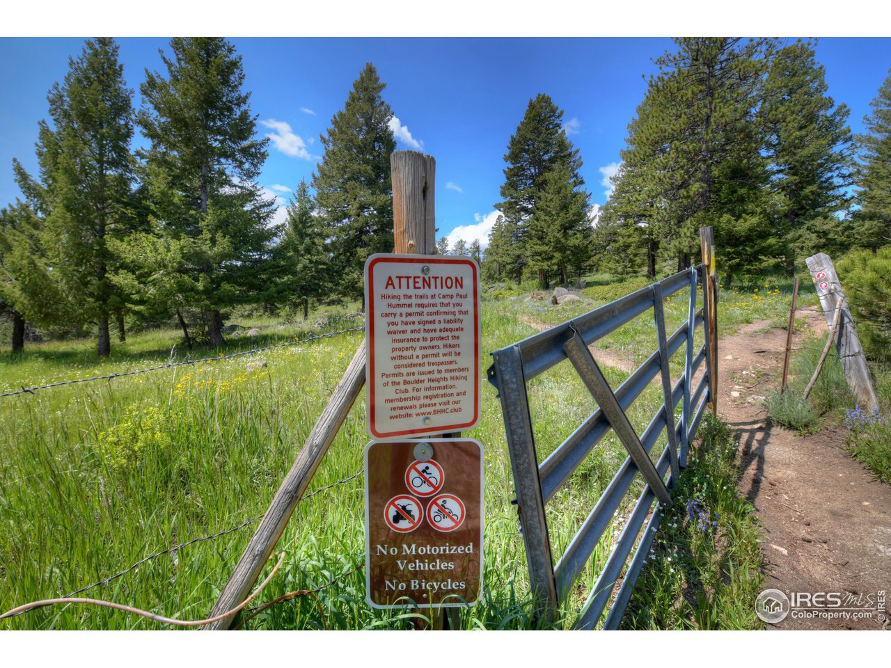 493 Sky Trail Road Boulder, CO 80302 - Photo 3 of 40 a view of swimming pool from a lake view