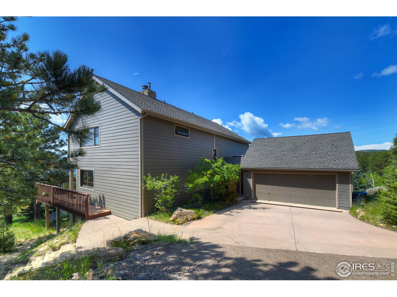 493 Sky Trail Road Boulder, CO 80302 - Photo 40 of 40 a front view of a house with a yard