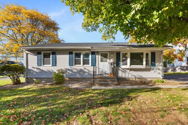 a house view with a garden space