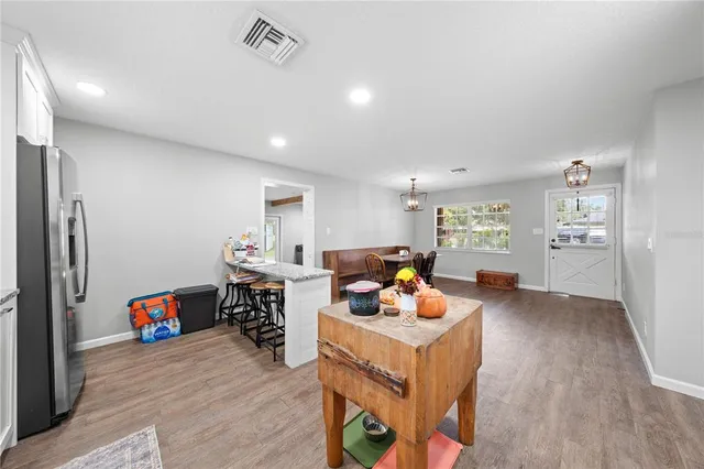 a kitchen with counter top space cabinets and stainless steel appliances