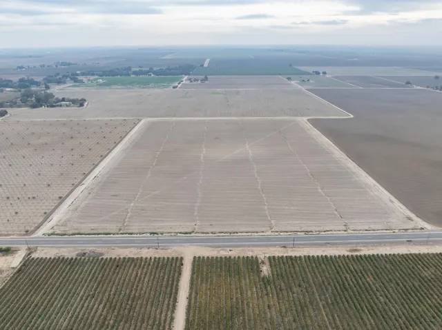 a view of a swimming pool and an outdoor space