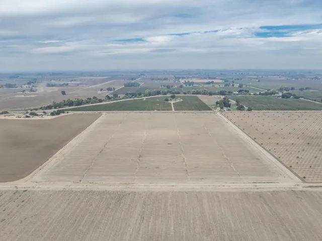 a view of a swimming pool and an outdoor space