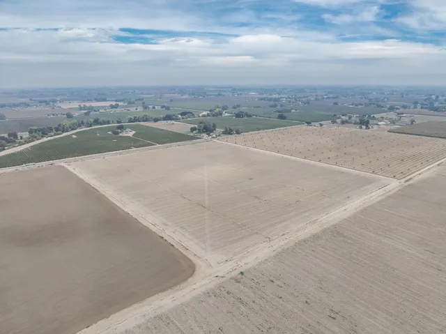 a view of a swimming pool and an outdoor space