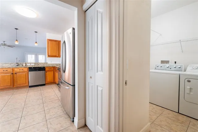 a view of a kitchen with electric appliances