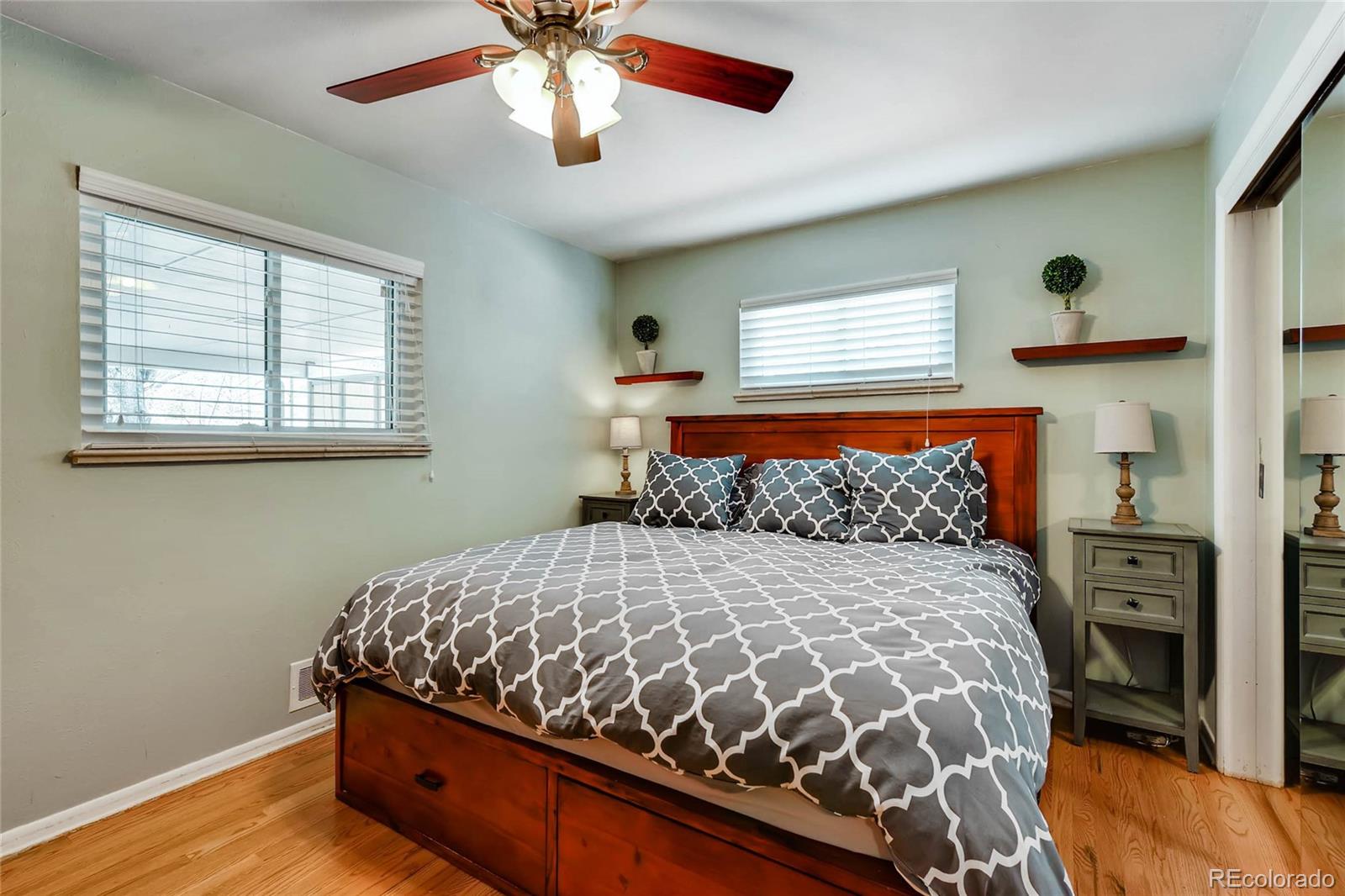 859 South Hudson Street Denver, CO 80246 - Photo 14 of 34 a bedroom with a bed and window