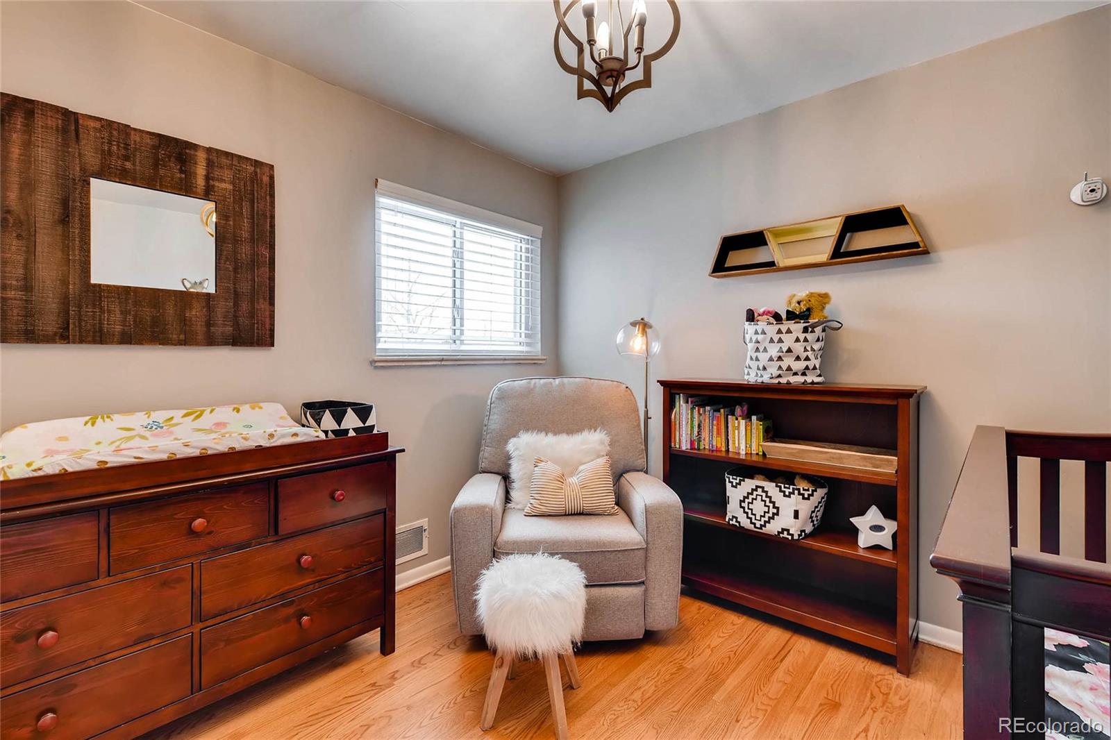 859 South Hudson Street Denver, CO 80246 - Photo 17 of 34 a living room with furniture and a window