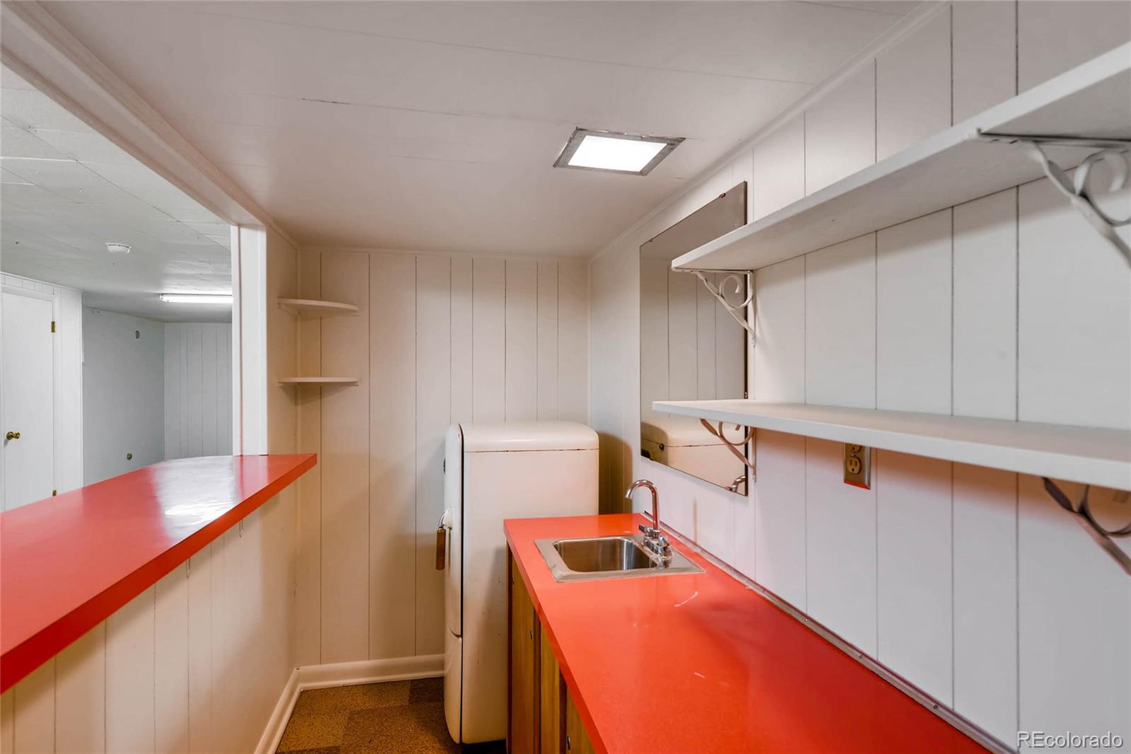 859 South Hudson Street Denver, CO 80246 - Photo 22 of 34 a room with storage and utility